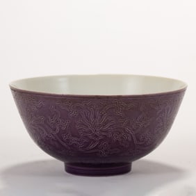 A CHINESE SGRAFITTO FLORAL RED BOWL