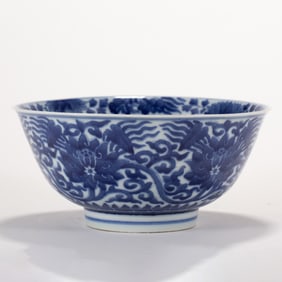 A CHINESE BLUE & WHITE WRAPPED LOTUS BOWL