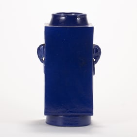 A CHINESE BLUE MONOCHROME CONG VASE