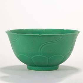 A CHINESE FAMILLE VERTE MONOCHROME BOWL