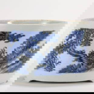 A CHINESE BLUE & WHITE LANDSCAPE MOTIF BRUSH POT: Dimensions: Weight: 2190g, Diameter: 18.5cm, Height: 13 cm A Chinese blue & white sages within waterside landscape motif porcelain brush pot. PROVENANCE: From the collections of Dan Peters (1946 - Pre