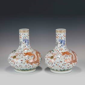 A PAIR OF GUANGXU FAMILLE ROSE DRAGON VASES (1 of 11)