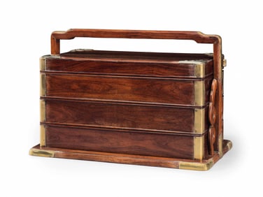 A HUANGHUALI THREE-TIERED PICNIC BOX, TIHE 17TH-18TH CENTURY