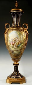 A 38-INCH ORMOLU-MOUNTED SEVRES TYPE URN SIGNED BERTREN