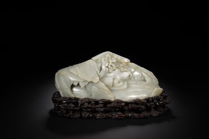 A JADE MOUNTAIN - SHAPED ORNAMENT