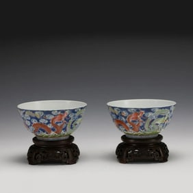 PAIR QING FAMILLE ROSE DRAGON BOWLS ON STANDS