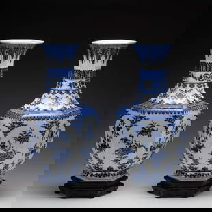 PAIR QING QIANLONG BLUE & WHITE HEXAGONAL VASES: Dimensions: Width: 21.5 cm x Heigth: 45.7 cm Pair of Chinese Qing Dynasty QianLong Blue and White Peony Porcelain Hexagonal Bottle Vase On Carved Hardwood Stand. The porcelain potted in shape vases,