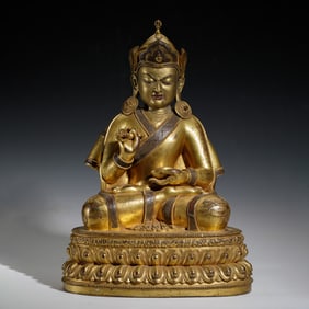GILDED BUDDHA STATUE