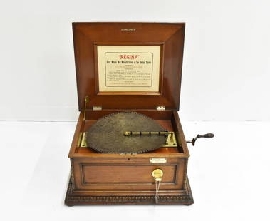 COIN OPERATED REGINA MUSIC DISC PLAYER: Rare Regina Music Disc Player, Coin Operated.. Serial # 34368 Original instructions on lid, comes with cash box, key and crank. Overall good original working condition. Dimension: 22-1/2" X 13" X 20-1