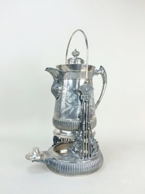 LATE 19TH C. SILVER PLATE COFFEE URN WITH FLORAL MOTIF