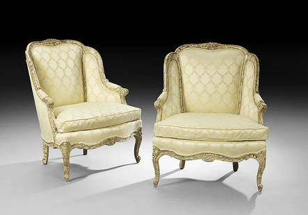 PAIR OF LOUIS XV-STYLE BERGERES AVEC ORIELLES: Pair of Louis XV-Style Polychrome Bergeres avec Orielles each with a padded trisected back surmounted by a floral crest, joined to the cushioned seat by padded arms, raised on molded cabriole legs