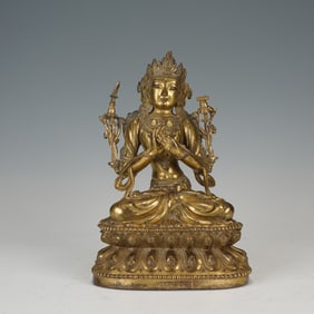 A GILDED BRONZE SEATED STATUE OF MANJUSHRI BODHISATTVA