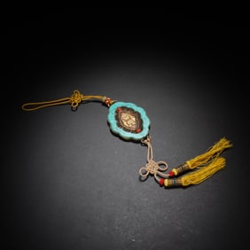 A SILVER - GILDED WAIST BADGE