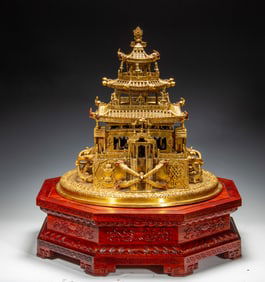 A GILDED METAL BUDDHIST PAGODA ORNAMENT