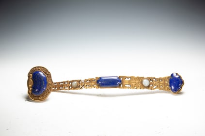 AN EXQUISITE RUYI ORNAMENT