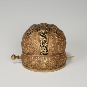 A GILDED SILVER CROWN - SHAPED ORNAMENT