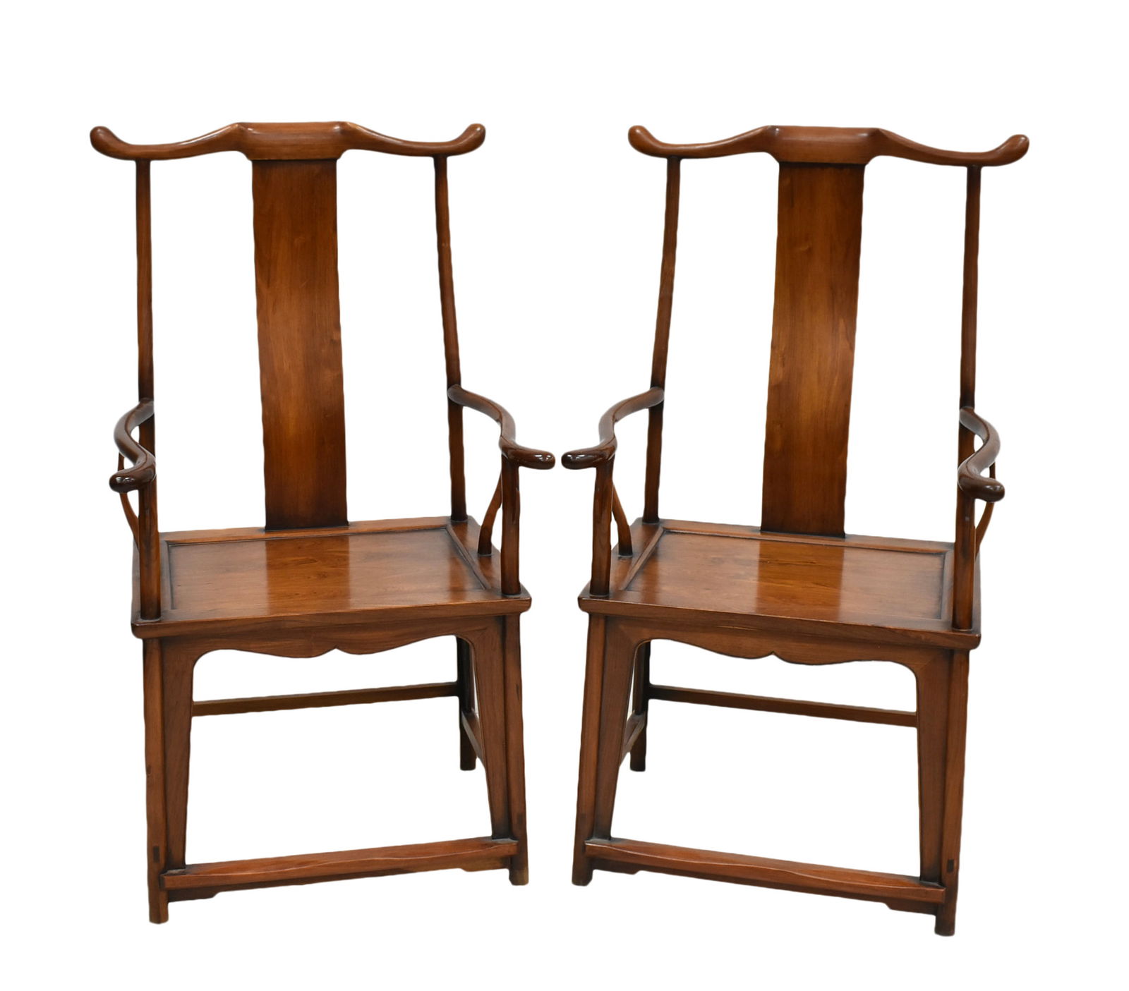 PAIR OF HUANGHUALI OFFICER HAT ARMCHAIRS: Measurements: (EACH) 47-1/2" H x 26-5/8" W x 21-1/2" D Chinese Qing Dynasty officer hat, yoke back arm chairs, Each has a curved, protruding crest rail supported on an S-shaped splat and elegantly cur