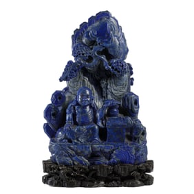LAPIS LAZULI CARVING OF FIGURE IN LANDSCAPE