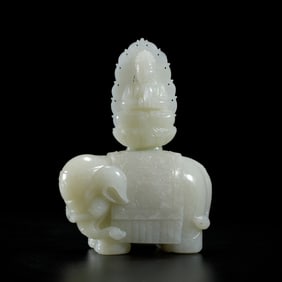 JADE CARVING OF BUDDHA SEATED ON ELEPHANT