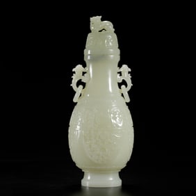 WHITE JADE VASE WITH MYTHICAL BEAST LID AND ORNATE HANDLES