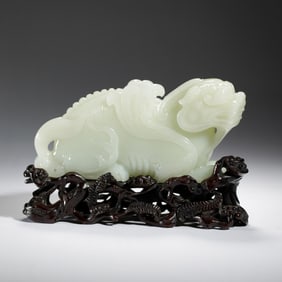 WHITE JADE PIXIU CARVING ON INTRICATE WOODEN BASE