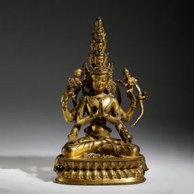 GILT-BRONZE STATUE OF MULTI-HEADED & MULTI-ARMED BUDDHIST BODHISATTVA