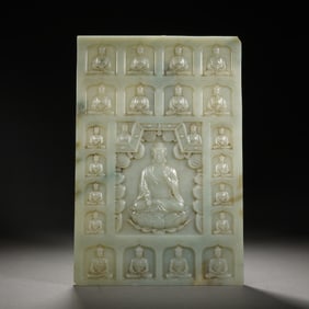 JADE BUDDHIST RELIEF PLAQUE WITH CENTRAL AND SURROUNDING BUDDHA FIGURES
