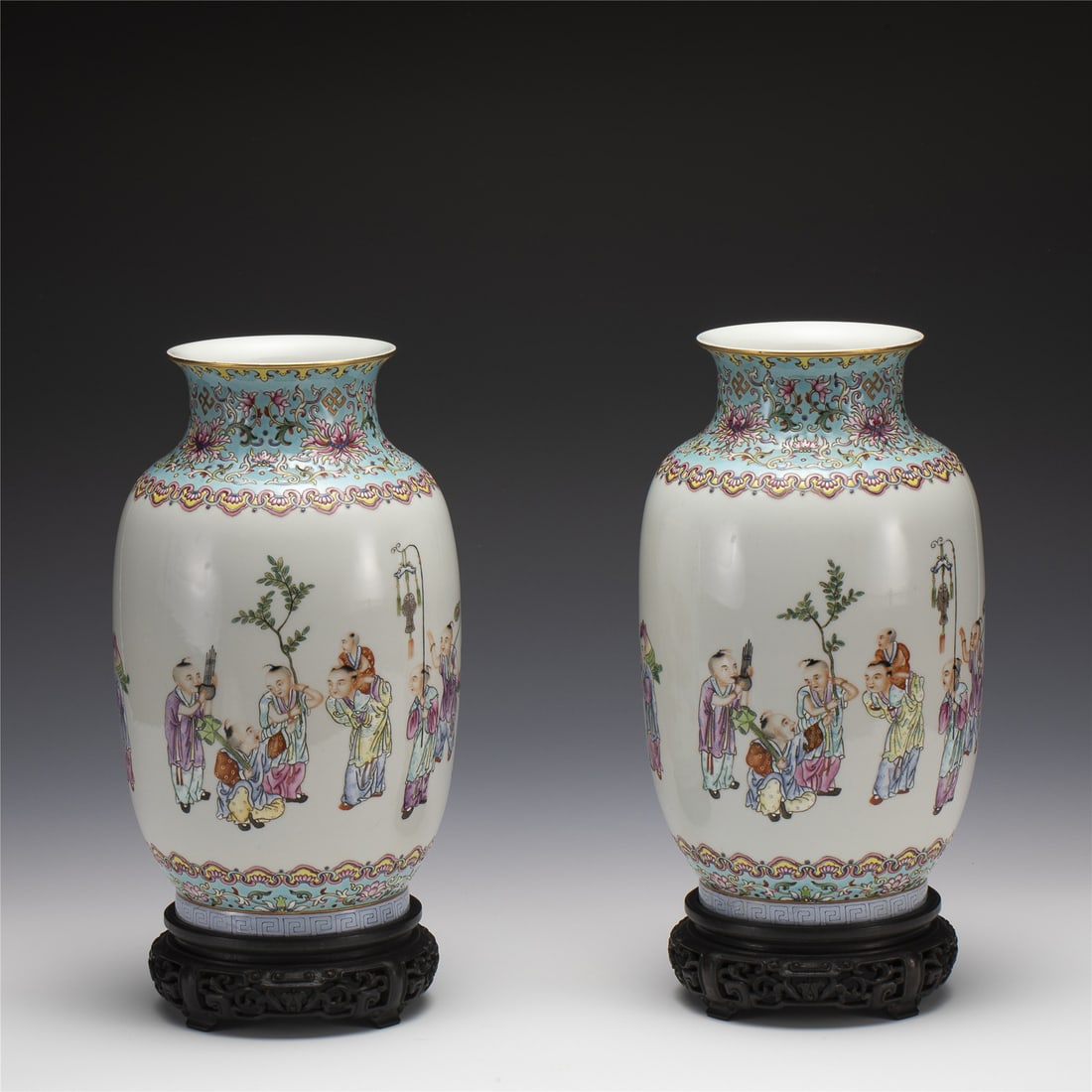 PAIR OF QING QIANLONG FAMILLE ROSE BOTTLE VASES ON STAND: Measurements: Length: 15 cm, Height: 25.6 cm Pair of Chinese Qing Dynasty Qianlong Famille Rose Porcelain Lantern Bottle Vases On Carved . Potted lantern shaped vase, large thick and tall body, cylind