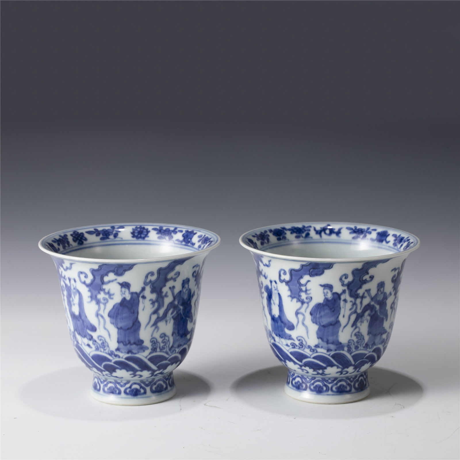 PAIR OF MING BLUE & WHITE BOWLS: Dimensions: 12.6cm L x 12.6cm W x 11cm H Pair of Chinese Ming Dynasty Jiajing Blue and White Eight Immortals Porcelain Bowls. Potted in a shallow body, slight deep, thick and bulbous body, with angled