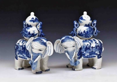 PAIR OF BLUE & WHITE PORCELAIN ELEPHANT EFFIGIES