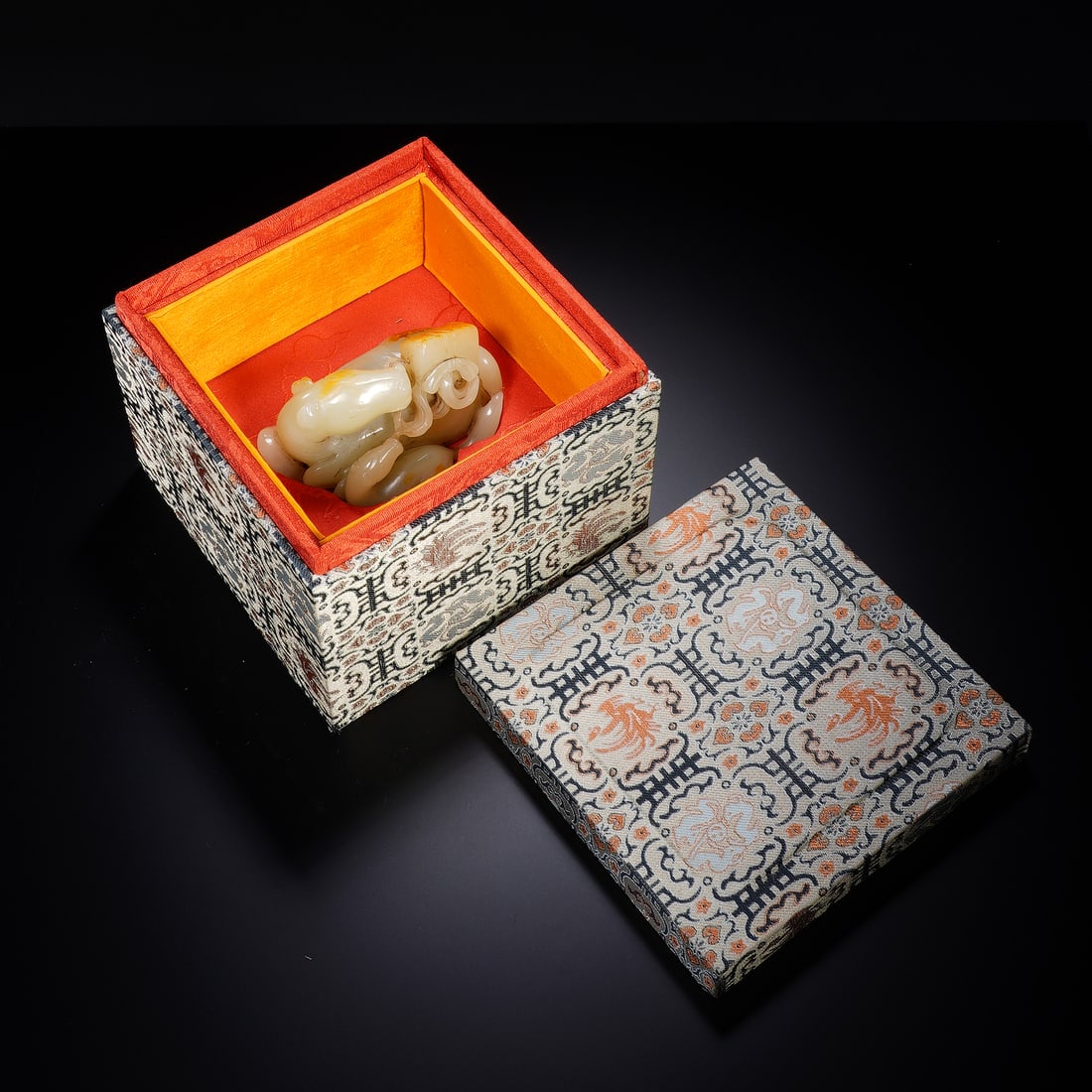 CHINESE WHITE JADE HORSE & LETTER: Dimensions: 9x5x6 cm. Weight 286 grams. A charming Chinese white jade carving of a horse with a tied letter, rendered in pale celadon jade with natural russet inclusions. The horse is depicted in a re