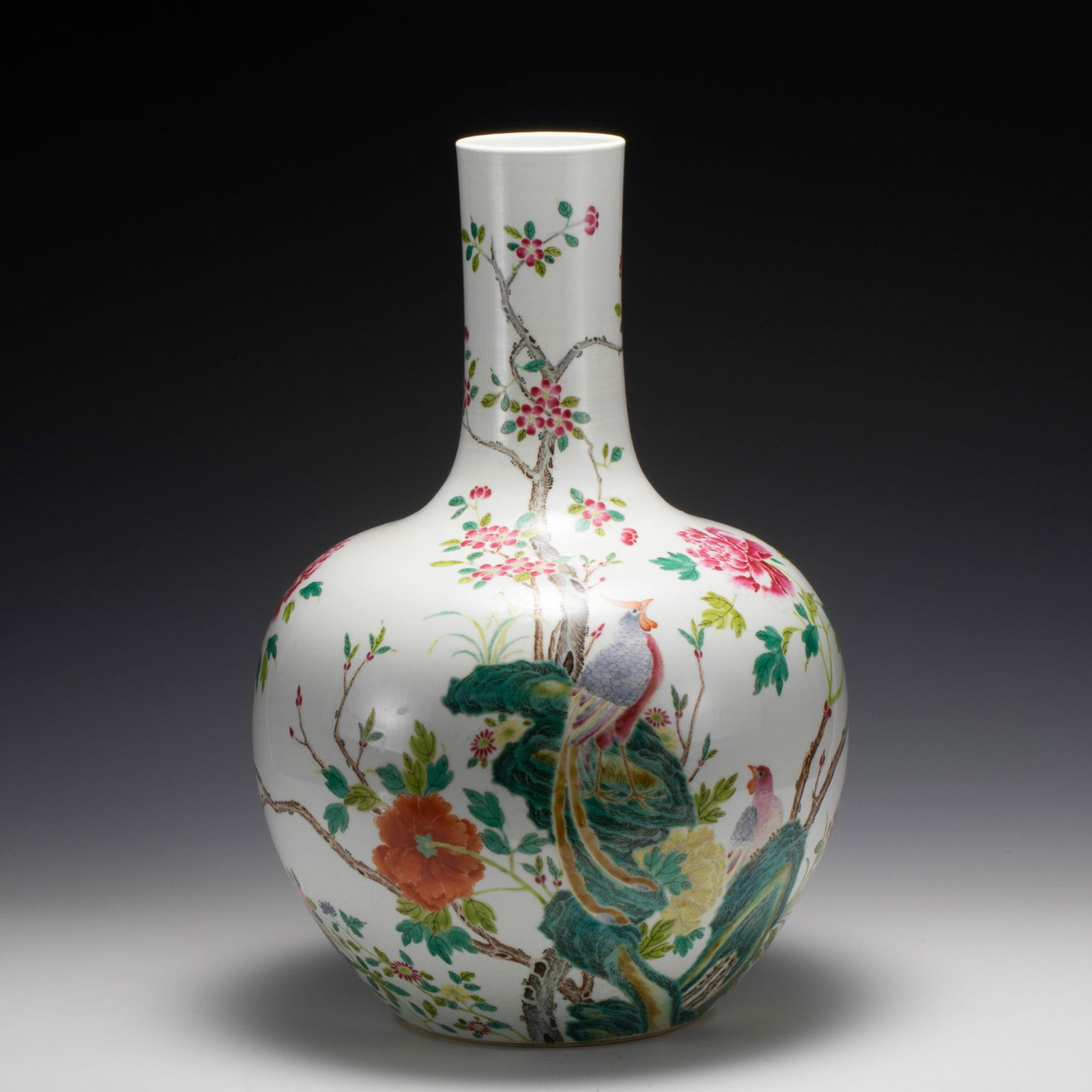 QING FAMILLE ROSE CELESTIAL BOTTLE VASE: Dimensions: Width: 30. 5 cm x Heigth: 44. 6 cm Chinese Qing Dynasty Yong Zheng Blue and White Peacock Porcelain Celestial Bottle Vase On Carved Hardwood Stand. Potted in celestial shape vase, thick an