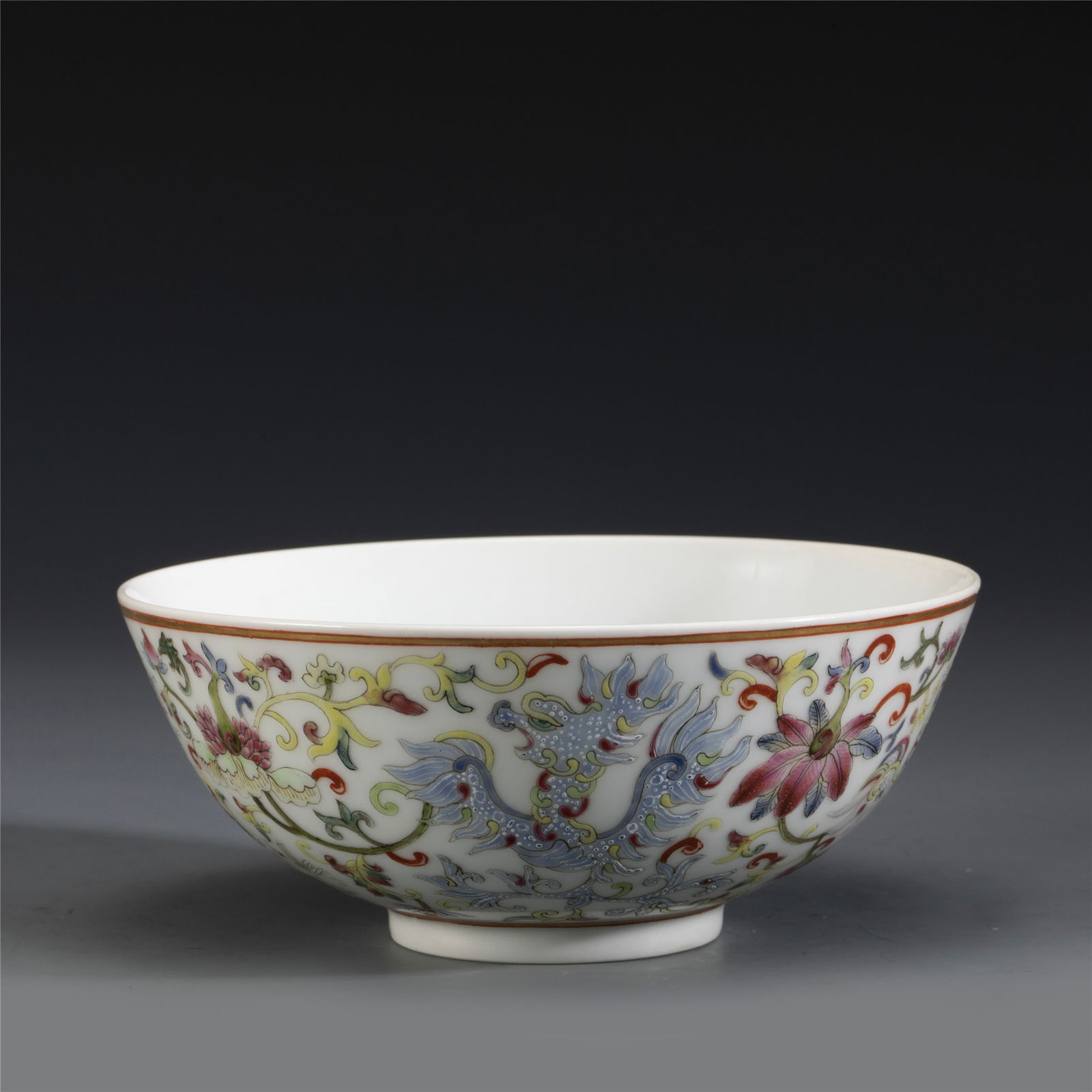 QING DAOGUANG FAMILLE ROSE PHOENIX BOWL: Dimensions: Width: 14cm, Height: 6cm. Chinese Qing Dynasty DaoGuang Famille Rose Phoenix Porcelain Bowl. The porcelain potted in a shallow, slight deep, round close mouth rim, raised on ring foot base