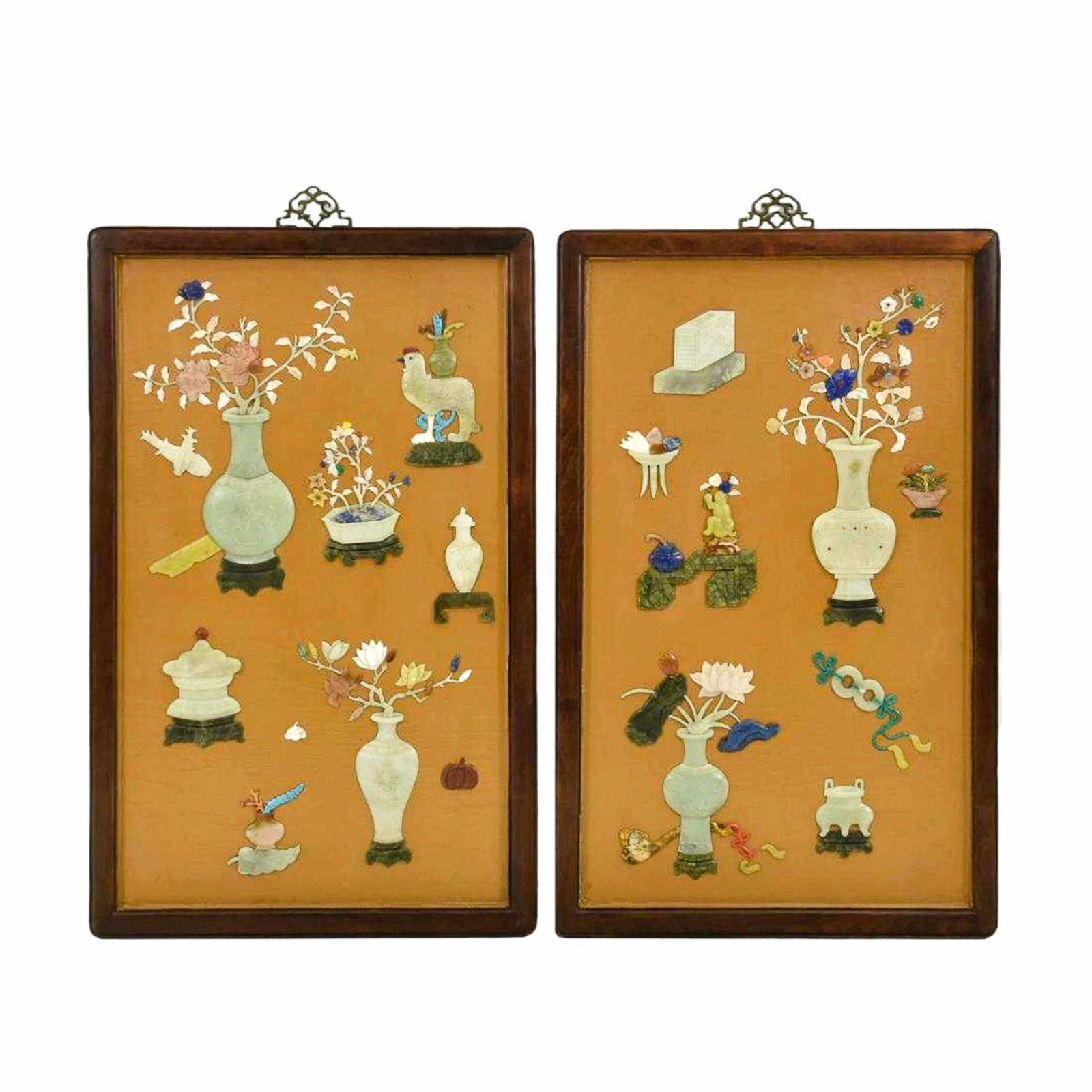 PAIR OF EMBELLISHED HARDWOOD VENEERED WALL PANELS: Measurements: 35-1/2" L x 23" W (each) Each rectangular panel is embellished with jade, colorful semi-precious hard stones with a central vase containing flowers surrounded by various 'antiques' and r