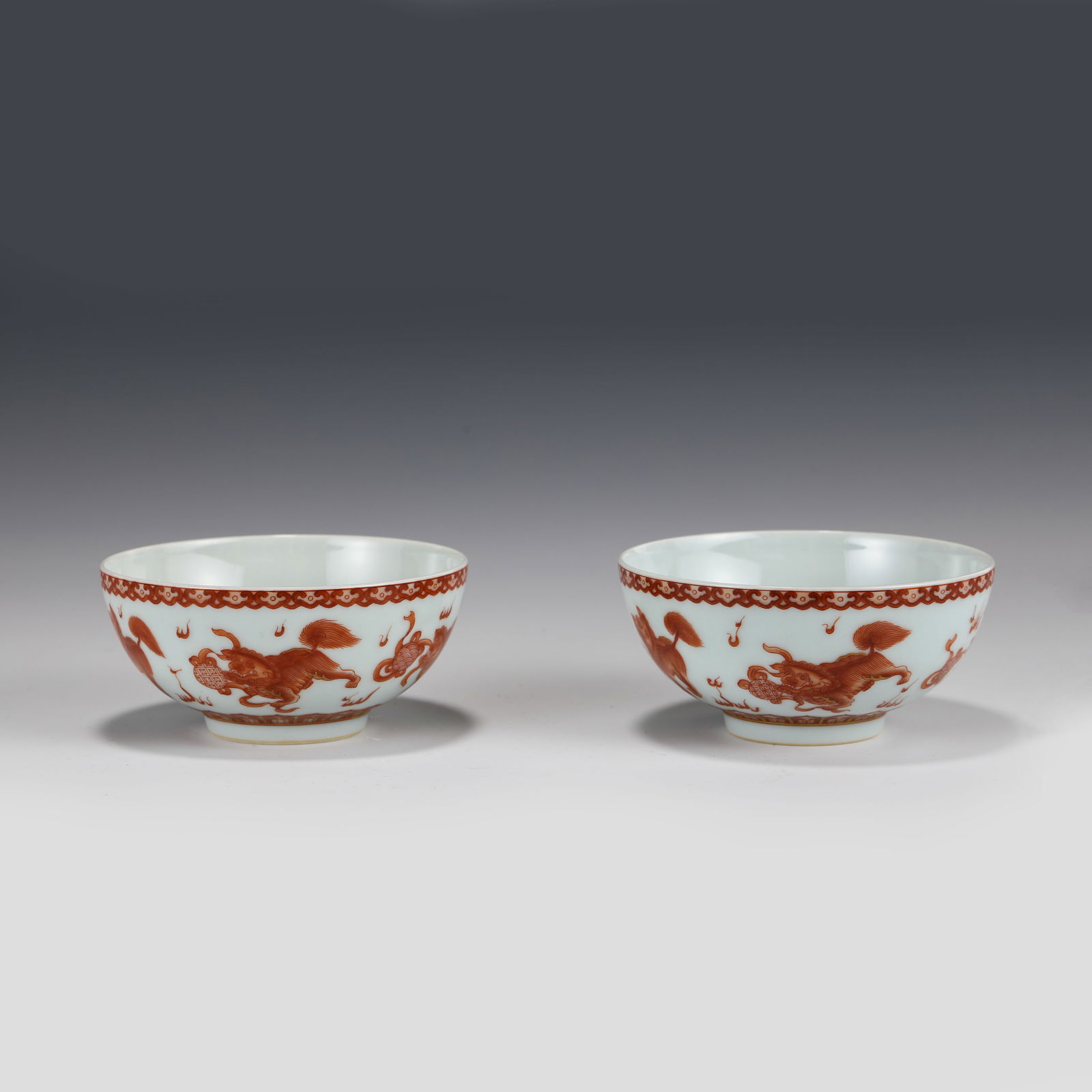 PAIR IRON RED MYTHICAL BEAST MOTIF BOWLS (1 of 6)