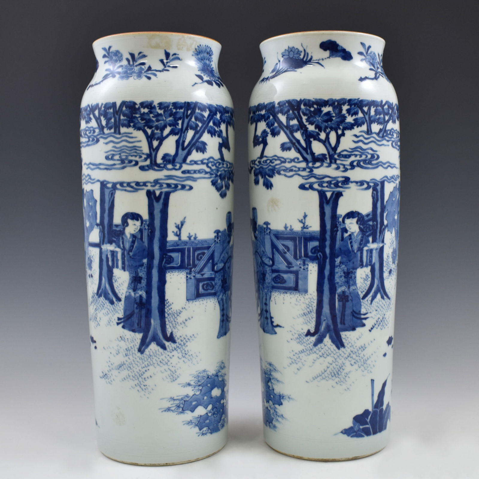 PAIR BLUE & WHITE FIGURIAL ELEPHANT LEG VASES: Dimensions: 16-1/2" H x 6-1/4" Diam. (each) A Pair Chinese porcelain Xiangtuiping vase, elephant leg shaped body, potted with a short, waisted neck and tall, straight sides, wider toward the faceted s