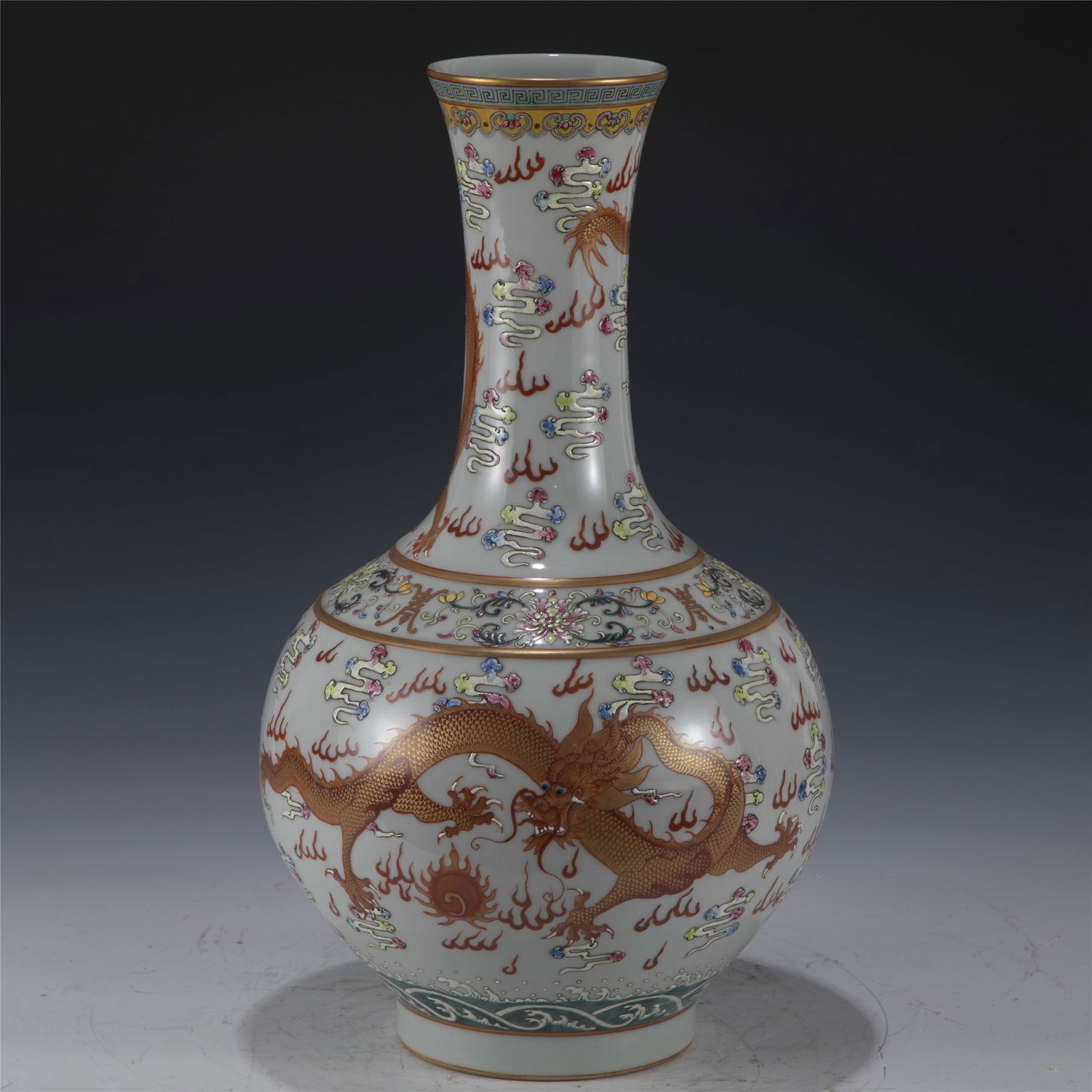 QING GUANGXU FAMILLE ROSE DRAGOON BOTTLE: Dimensions: Length: 24. 8 cm, Width: 24. 8 cm, Height: 42 cm Chinese Qing Dynasty Guangxu Famille Rose Dragon Porcelain Celestial Bottle Vase. The Vase potted in celestial shape vase, thick and tall,