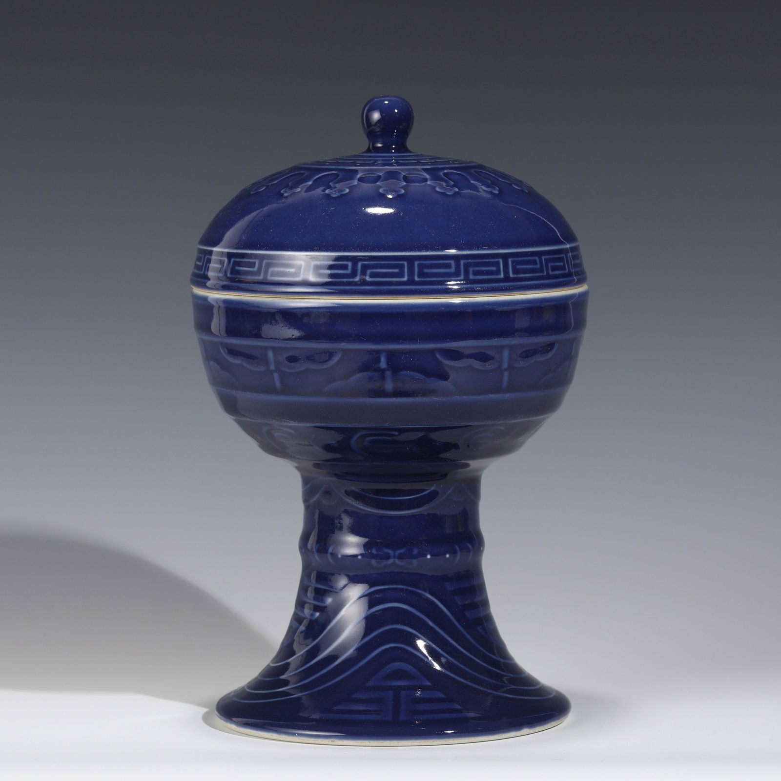 QING GUANGXU BLUE GLAZED LIDDED HIGH BOWL: Dimensions: Height: 25. 7 cm, Diam. 15. 5 cm Chinese Qing Dynasty Guangxu Blue Glazed Porcelain Lidded High Bowl. The porcelain potted with a shallow body, slight deep, thick and bulbous body, with an