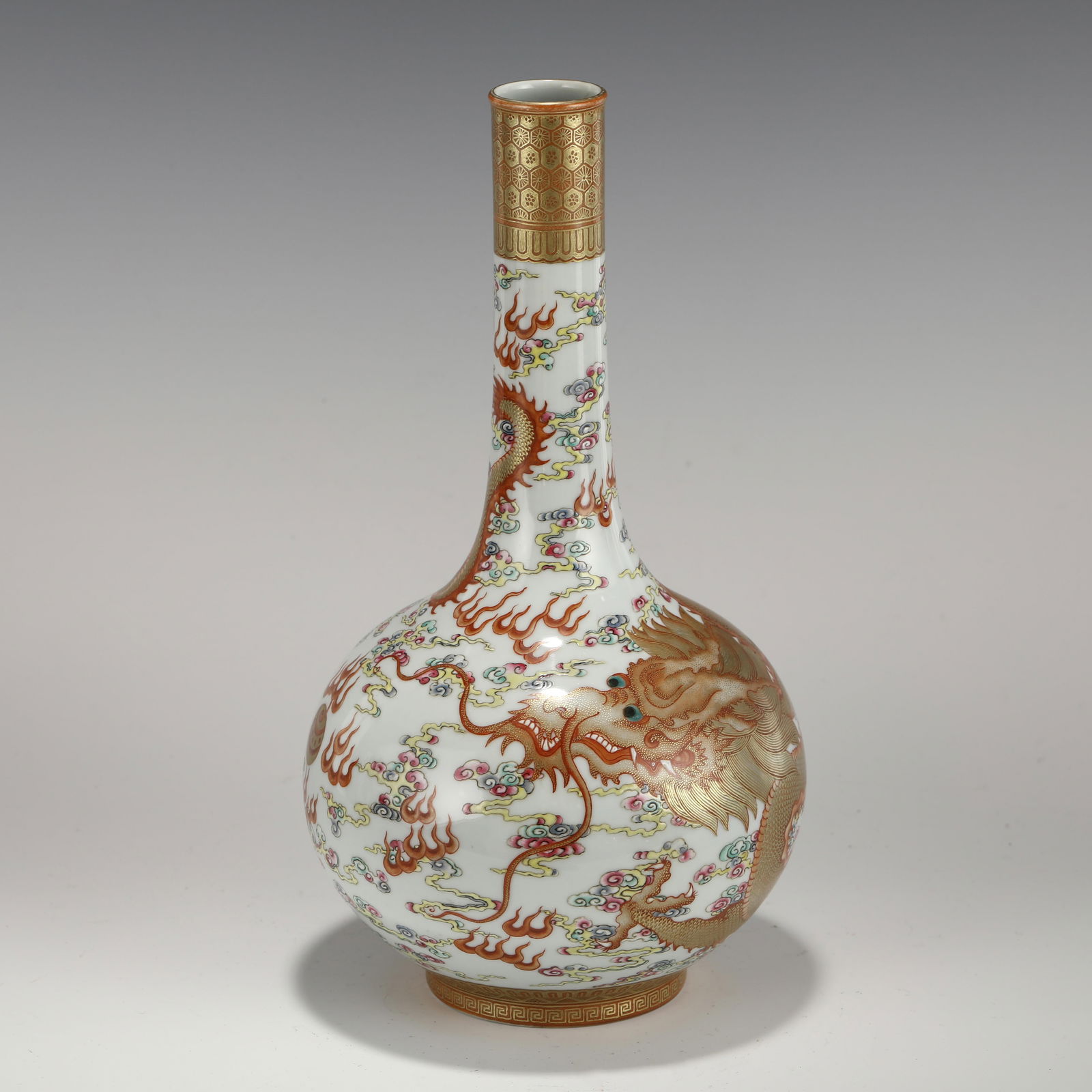 KANGXI FAMILLE ROSE GOLDEN DRAGON BOTTLE VASE: PROVENANCE: From Bellefonte, Delaware Private Collector. Dimensions (cm): Height: 33cm, Diam.: 17 Chinese Qing Dynasty KangXi Famille Rose Golden Dragon Porcelain Reward Vase. Potted in reward shape v