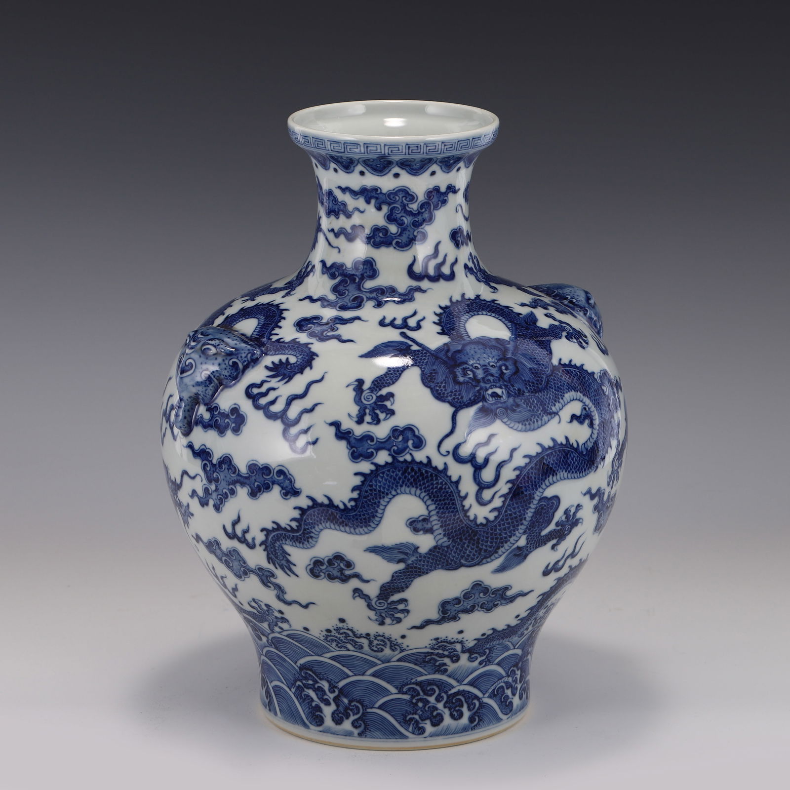 BLUE & WHITE DRAGON AMPHORA ZUN VASE: Dimensions: Height: 34.5cm,cm, Diam: 28cm Chinese Qing Dynasty Period, Qianlong Blue and white Dragon porcelain pot. This porcelain has an open round mouth lip, with slight flaring rim, slight tall ne