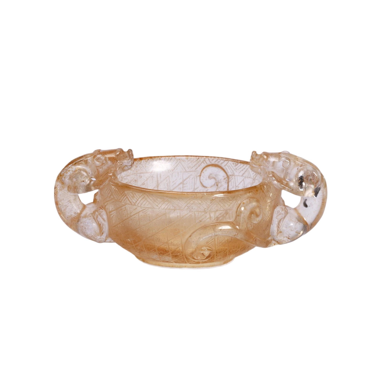 CHINESE CRYSTAL DRAGON-HANDLED CUP: Dimensions: L. 10 cm. W. 4.5 cm. H. 4 cm. Weight 100 grams. This exquisite Chinese crystal cup features a delicate, translucent body in a warm honey hue, carved with subtle spiral and geometric