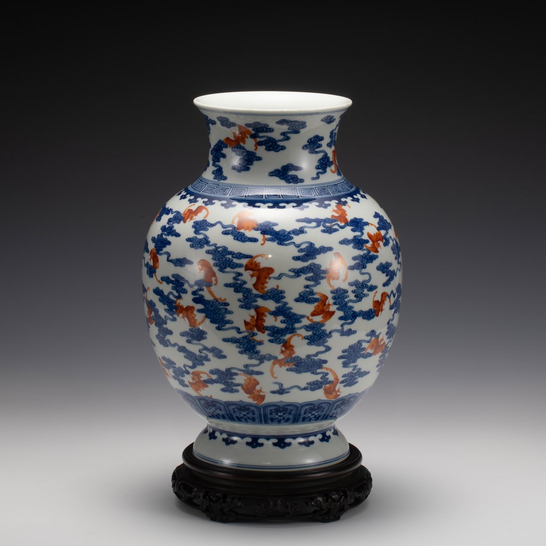 QING DAOGUANG BLUE & WHITE ALUM RED BOTTLE: Dimensions: Width: 22.2 cm x Height: 30.7 cm Chinese Qing Dynasty DaoGuang Blue White and Alum Red Fu Bat Porcelain Large Vase On Carved Hardwood Stand. The porcelain potted in large shape vase, thick