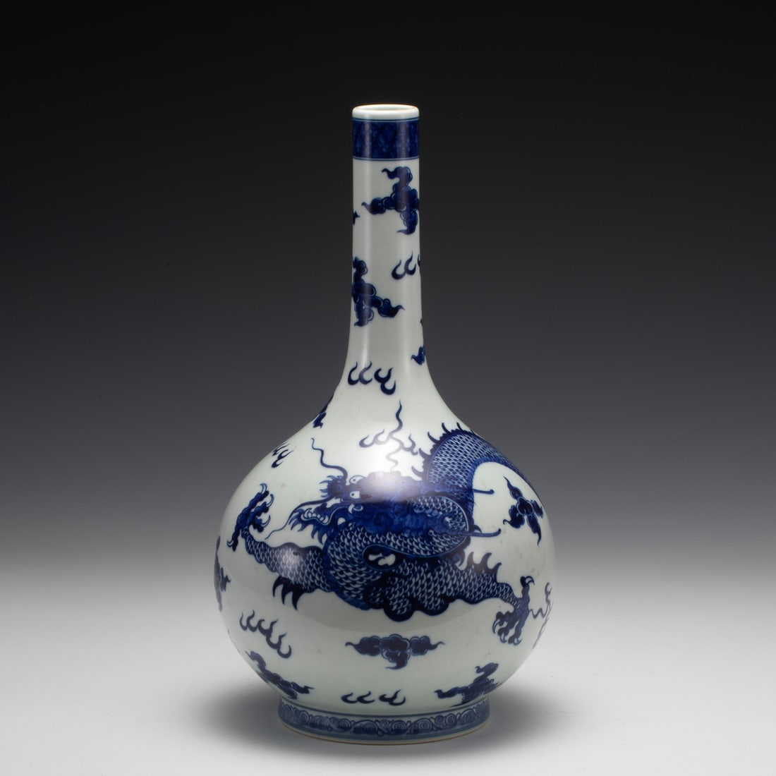 QING YONGZHENG BLUE PEKING BOTTLE VASE: Dimensions: Width: 19.4 cm x Height: 35.2 cm Chinese Qing Dynasty YongZheng Blue and White Dragon Porcelain Peking Bottle Vase. Potted in celestial shape vase, thick and tall, globular lower body, cyl