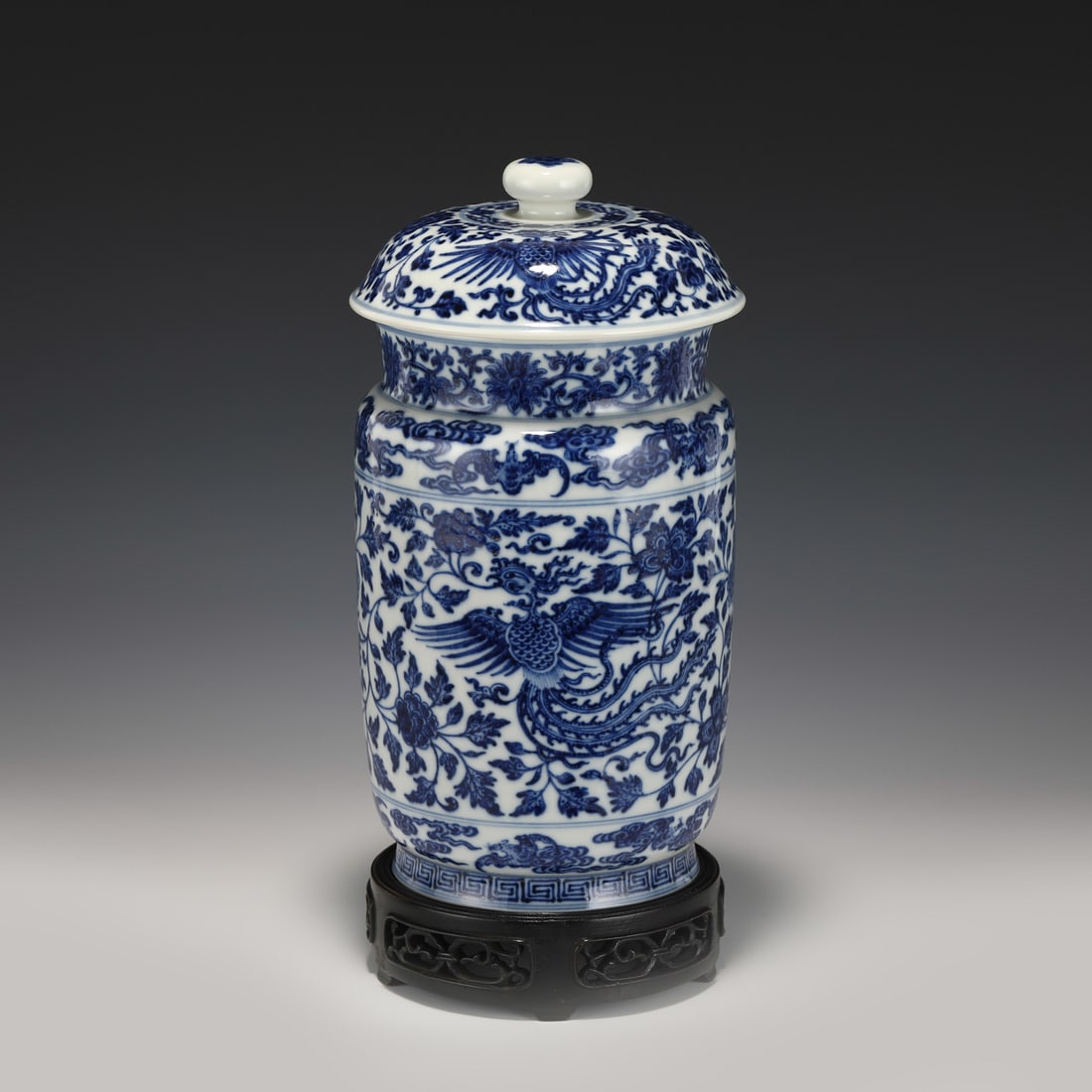 QING QIANLONG BLUE & WHITE JAR: Dimensions: Width: 14cm, Height: 27cm Chinese Qing Dynasty Qianlong Blue and White Porcelain Lidded Jar On Carved Hardwood Stand. Potted with a large cylindrical straight vessel, short neck, flaring r