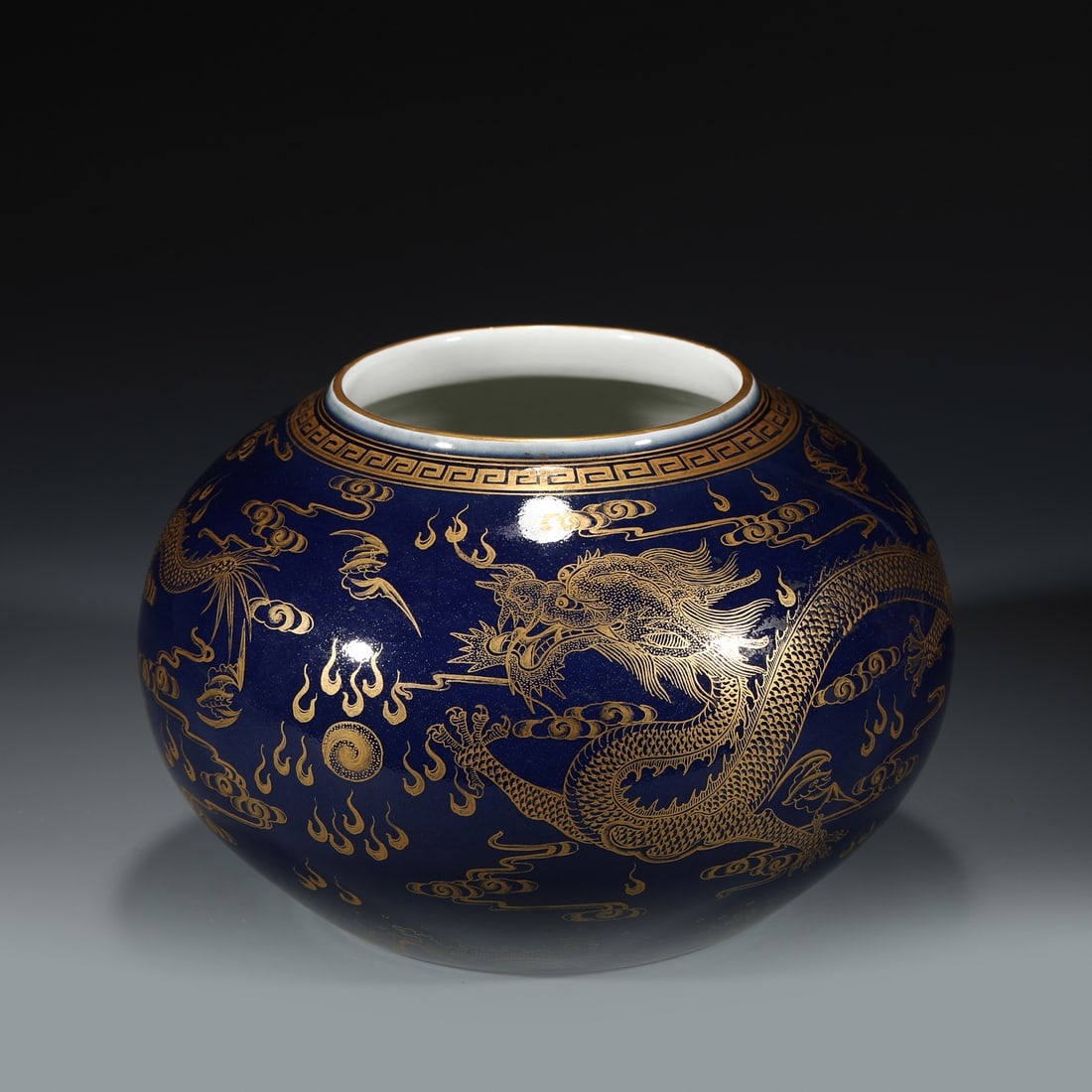 QING JI BLUE PAINTED GOLD WATER POT: Dimensions: Width: 18.5cm, Height: 12.5cm Chinese Qing Dynasty QianLong Ji blue and Gold decorated Porcelain Water Pot. Potted in a shallow body, slight deep, globular body, close mouth rim, raised on