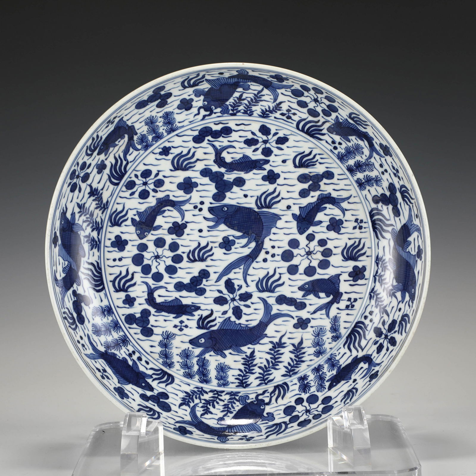 MING BLUE & WHITE CARP PLATE: Dimensions: Width: 40cm, Height: 7cm Chinese Ming Dynasty Blue and White Carp Porcelain Plate. The plates has a broad wide central interior, rounded mouth lip, thick and large, raised on correspondenc