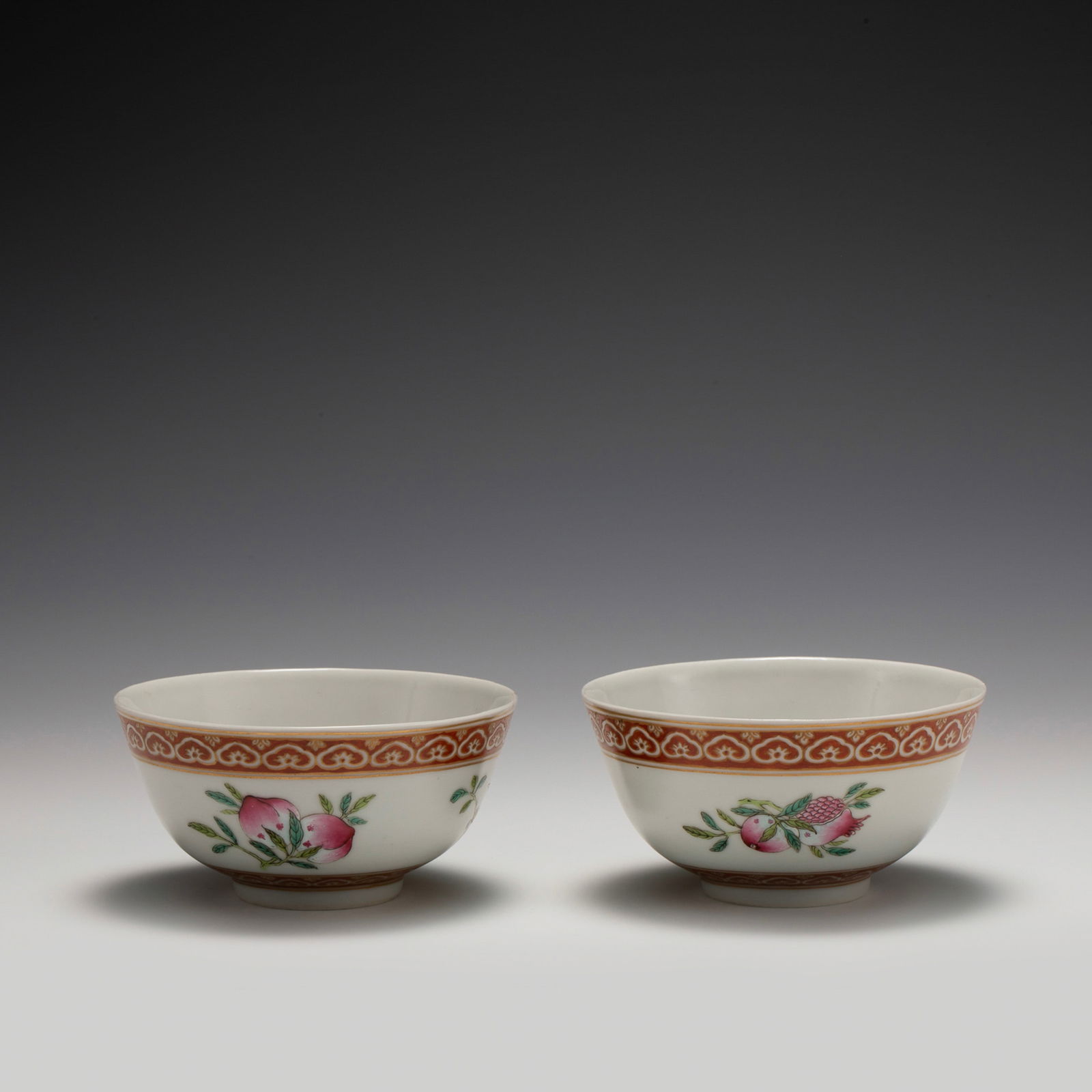 PAIR OF QING DAOGUANG FAMILLE ROSE POMEGRANATE BOWLS: Dimensions: Width: 11. 5 cm x Heigth: 5. 8 cm Pair of Chinese Qing Dynasty DaoGuang Famille Rose Pomegranate Porcelain Bowls. The porcelain potted in a shallow body, slight deep, flaring rim with clos