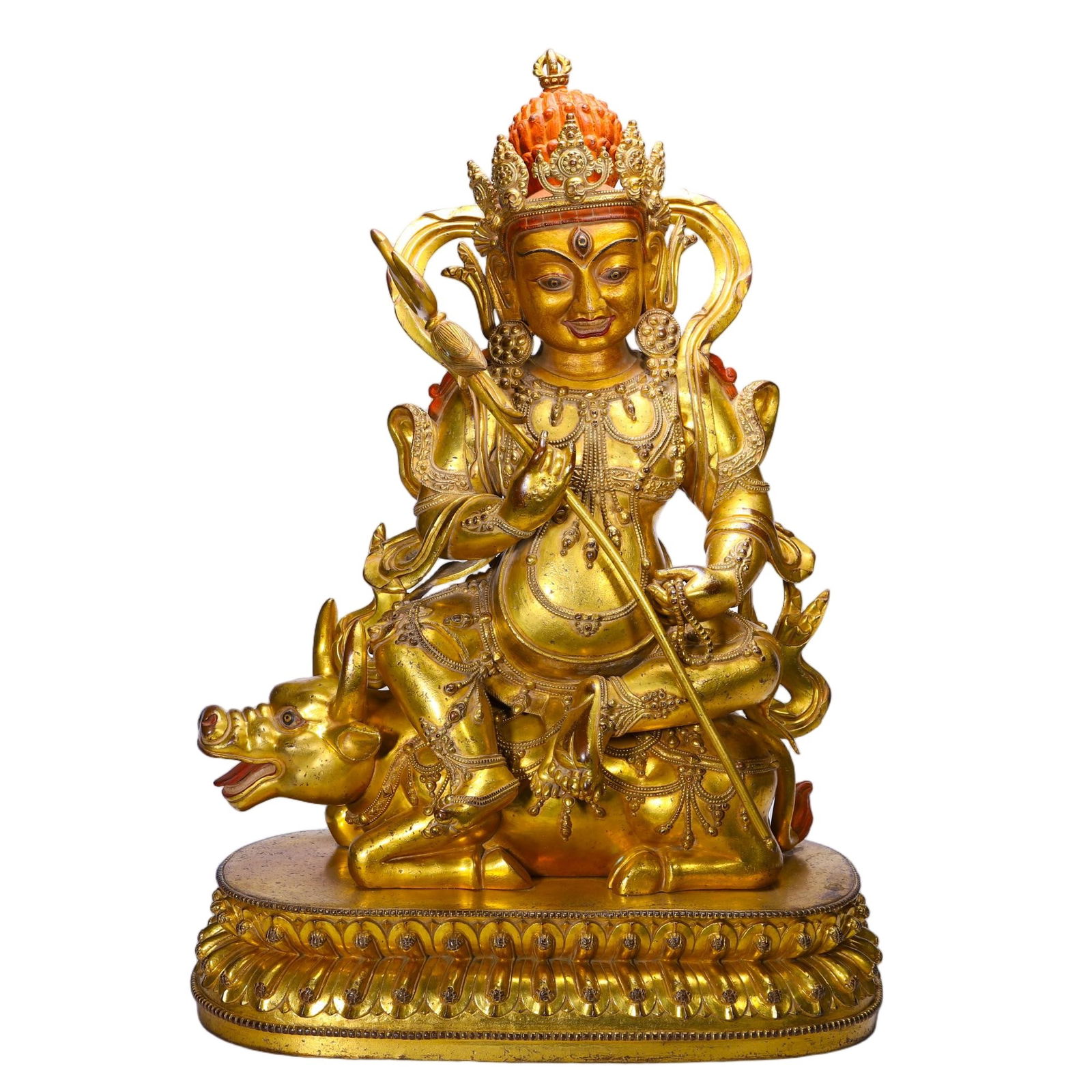 CHINESE GILT-BRONZE JAMBHALA: Dimensions: L. 36 cm. W. 19 cm. H. 53 cm. Weight 15420 grams. This resplendent Chinese gilt-bronze figure depicts Jambhala, the Buddhist deity of wealth, seated regally atop a mythical beast. The