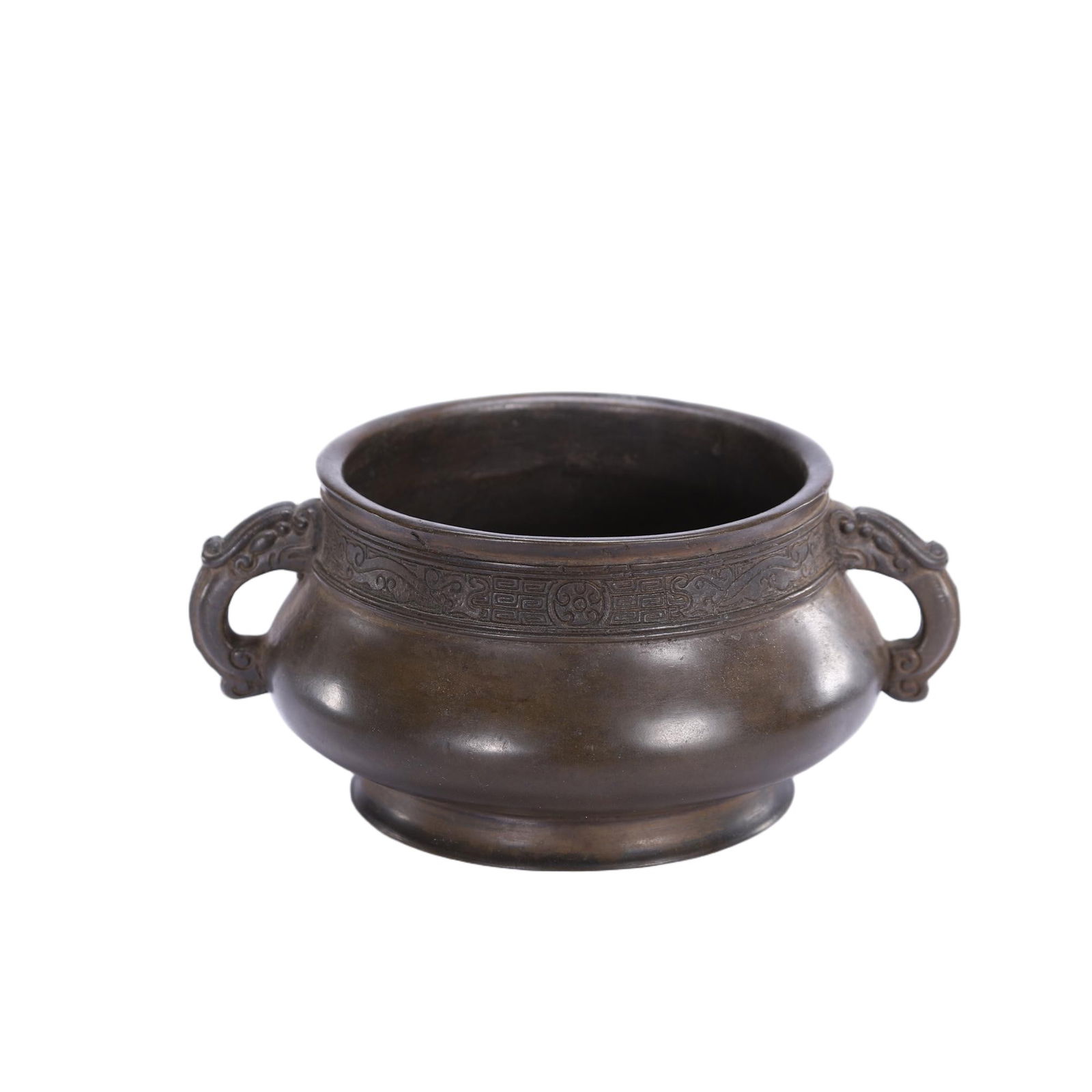 CHINESE BRONZE CENSER: Dimensions: L. 14.5 cm. W. 11.5 cm. H. 6 cm. Weight 800 grams. This elegant Chinese bronze censer features a broad, bulbous body with two stylized dragon handles, and a band of archaic scroll