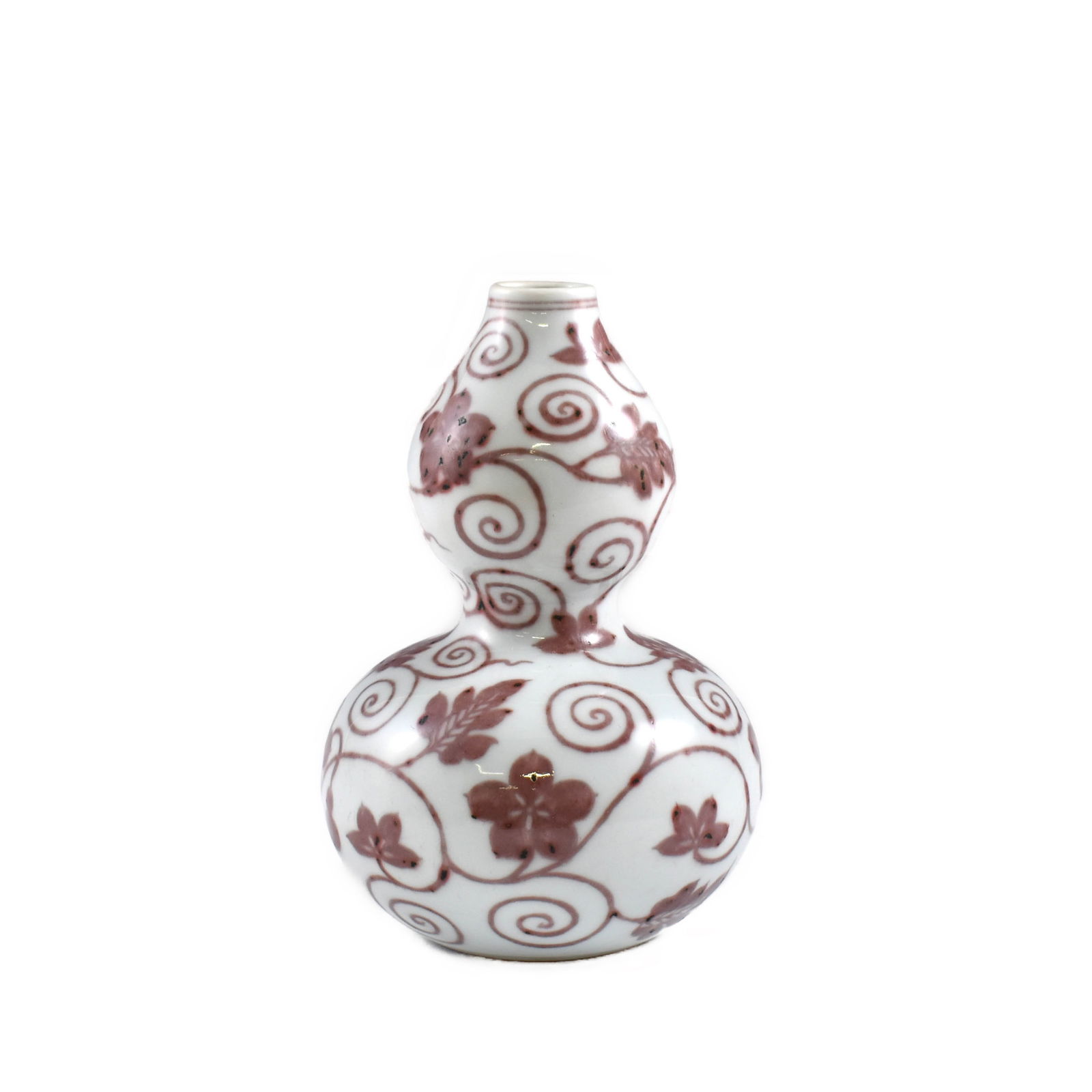 KANGXI RED & WHITE SCROLLING FLORAL DOUBLE GOURD VASE: Dimensions: 6-1/2" H x 5-1/4" Dia. Chinese Ming Dynasty period, Red & white scrolling floral Double gourd vase. Potted in a shape of double gourd resemblance, with two bulbous bellies conjoined togeth